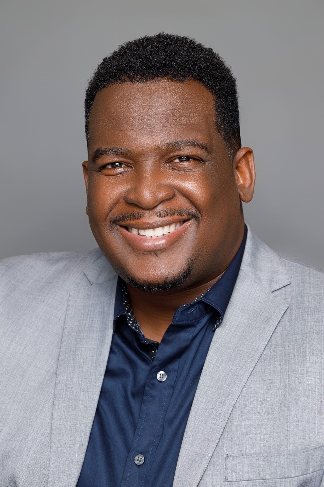 Mr. Andre Coore